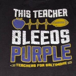 This Teacher Bleeds Purple T-Shirt!